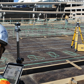 Engineer Measuring a Field